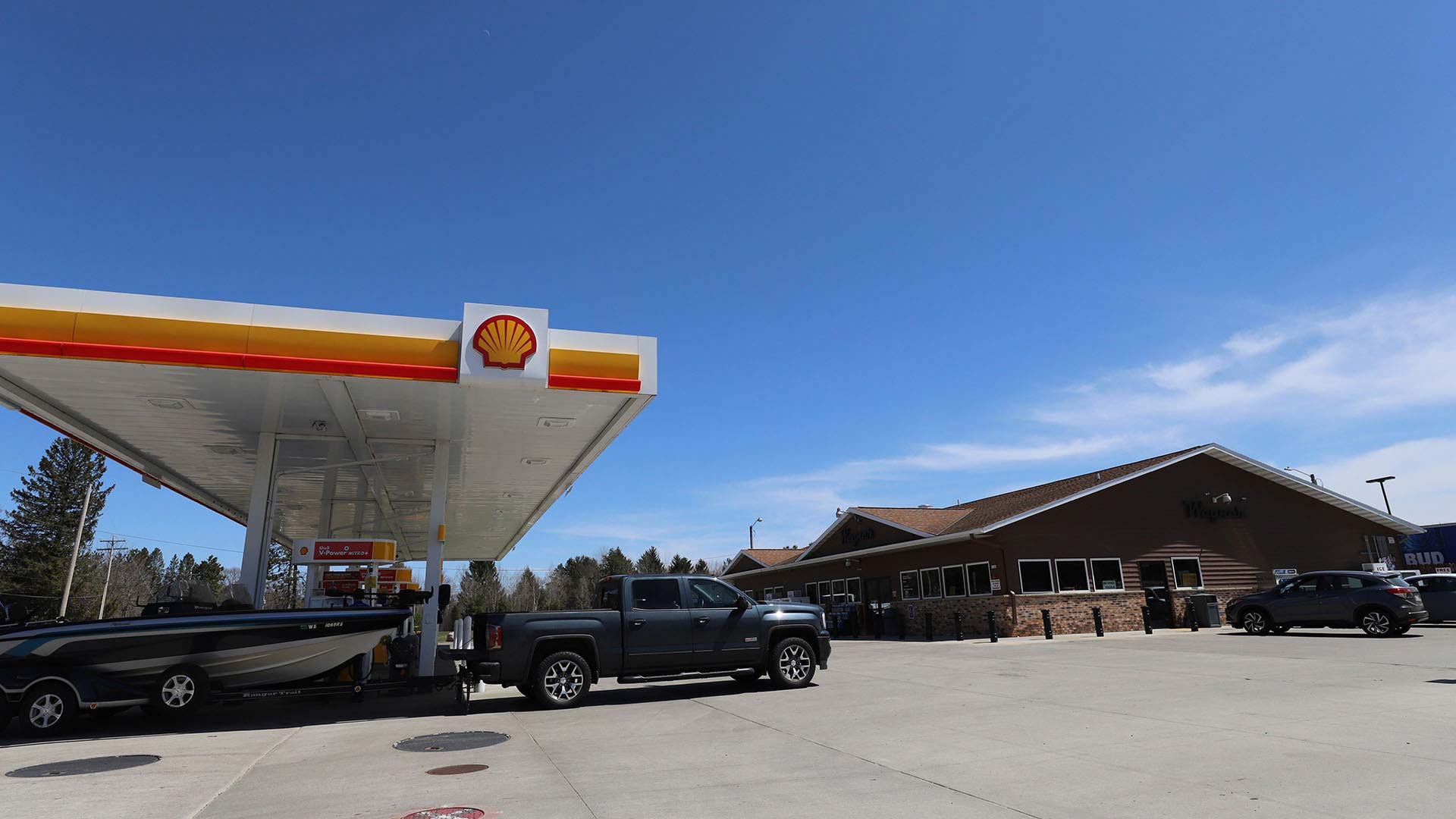 Shell gas station pumps and building