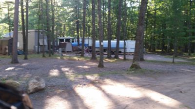 RVs and campers in the woods at the campground