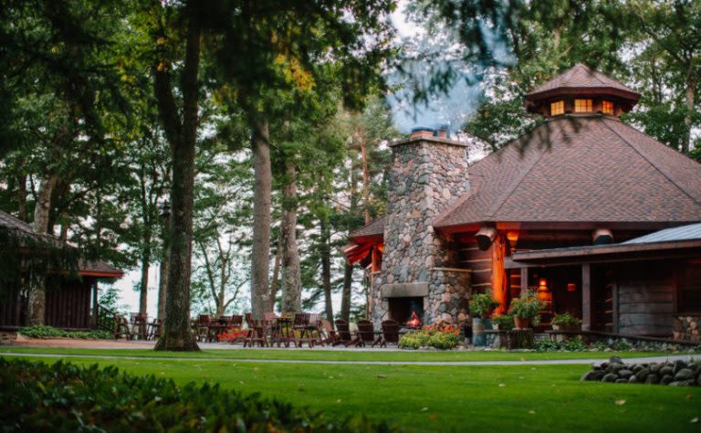 Exterior shot of the Red Crown lodge surrounded by trees