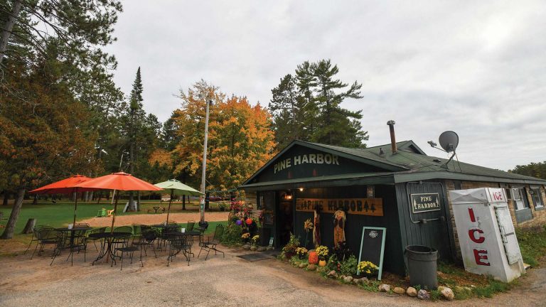 Pine Harbor Beach Bar & Grill | Pne harbor outside seating area in autumn
