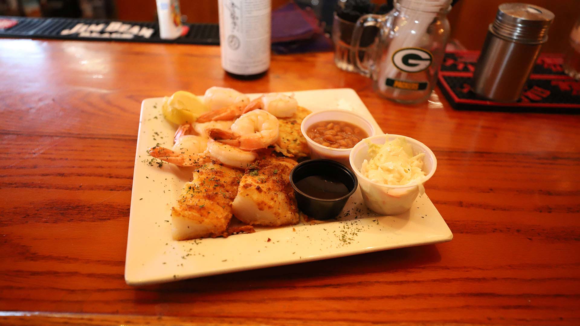 Fish and shrimp served on a plate