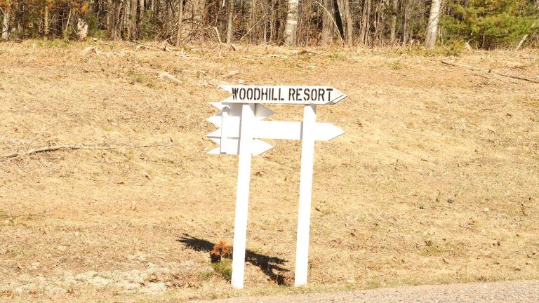 Woodhill Resort sign