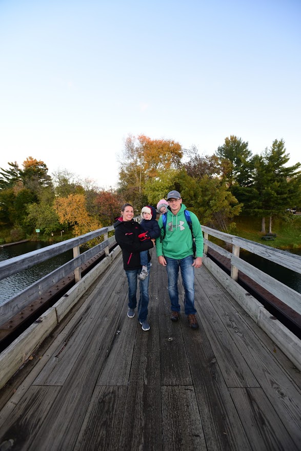 Family on Minocqua Trestle in fall