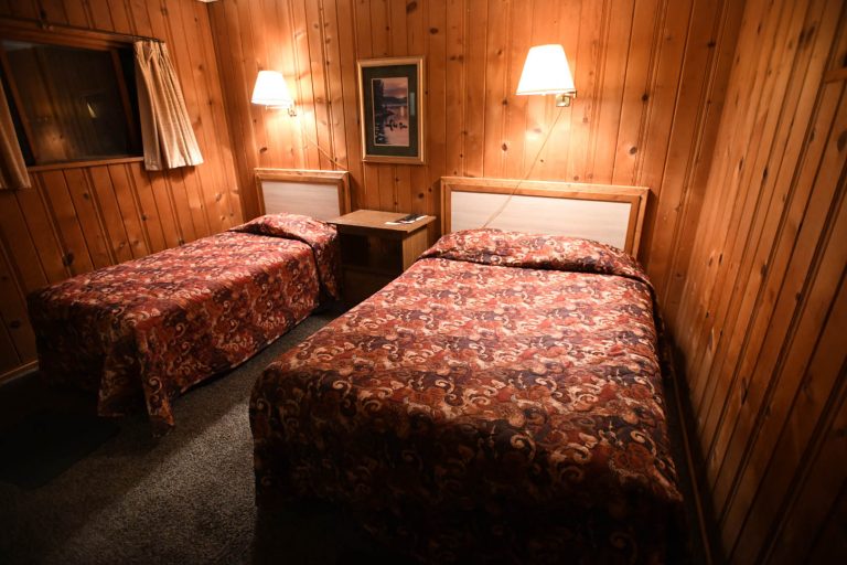 Triangle Motel | A look at a two bed room at the Triangle Inn
