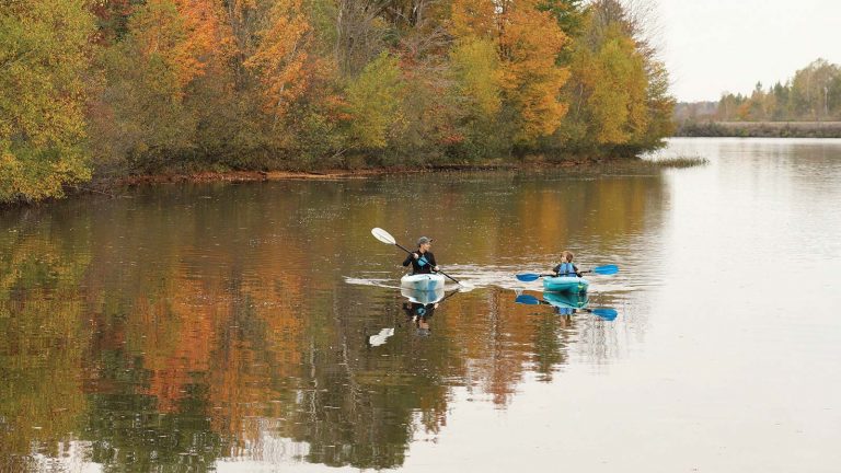 Related Article: Paddling the Wisconsin River | Two people kayaking the waters in autumn