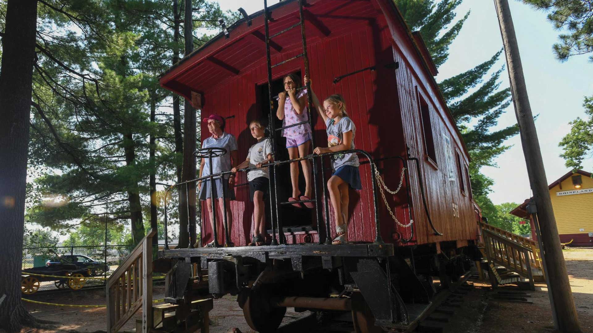 Family on train car at Pioneer Park Historical Complex