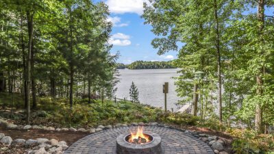 fire-pit overlooking a lake at Overlook Hotel