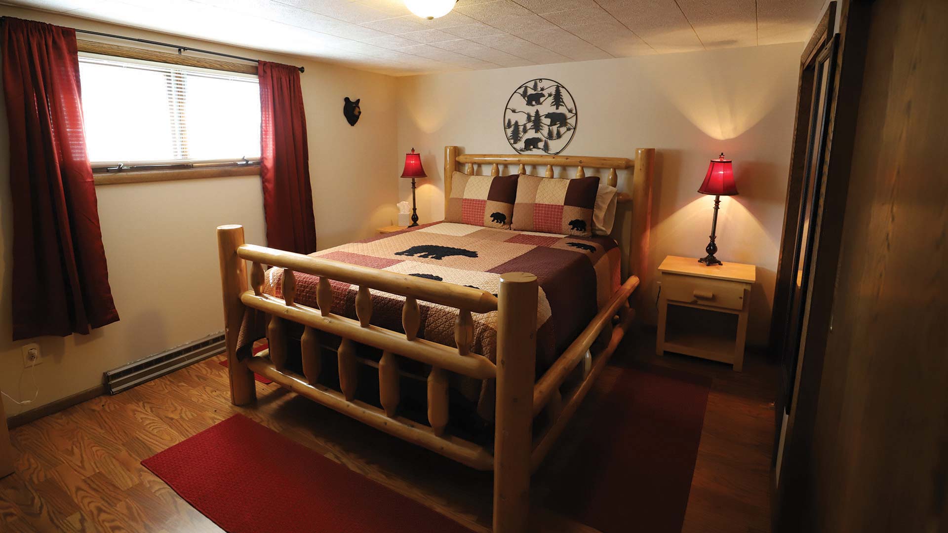 Cabin themed bedroom at Lake Tomahawk Lodge