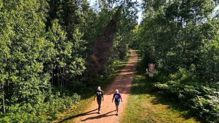 Related Article: Late-summer hikes to enjoy in Oneida County | Couple hiking on Bearskin State Trail Oneida County WI