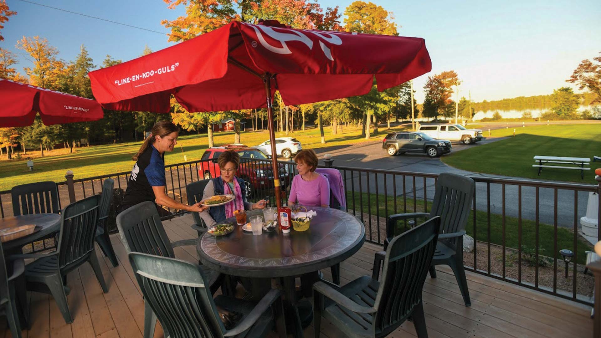 People being served food on the patio at Bonnie's Lakeside