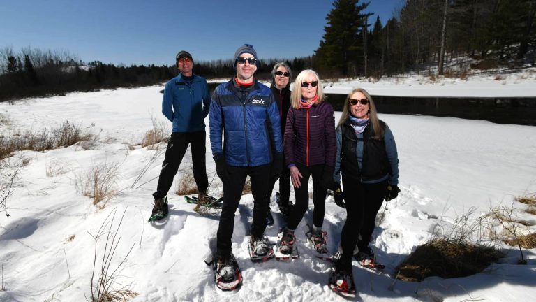 Related Article: Ideas for a quick winter getaway to Oneida County | Group snowshoeing at Minocqua Winter Park Oneida County WI