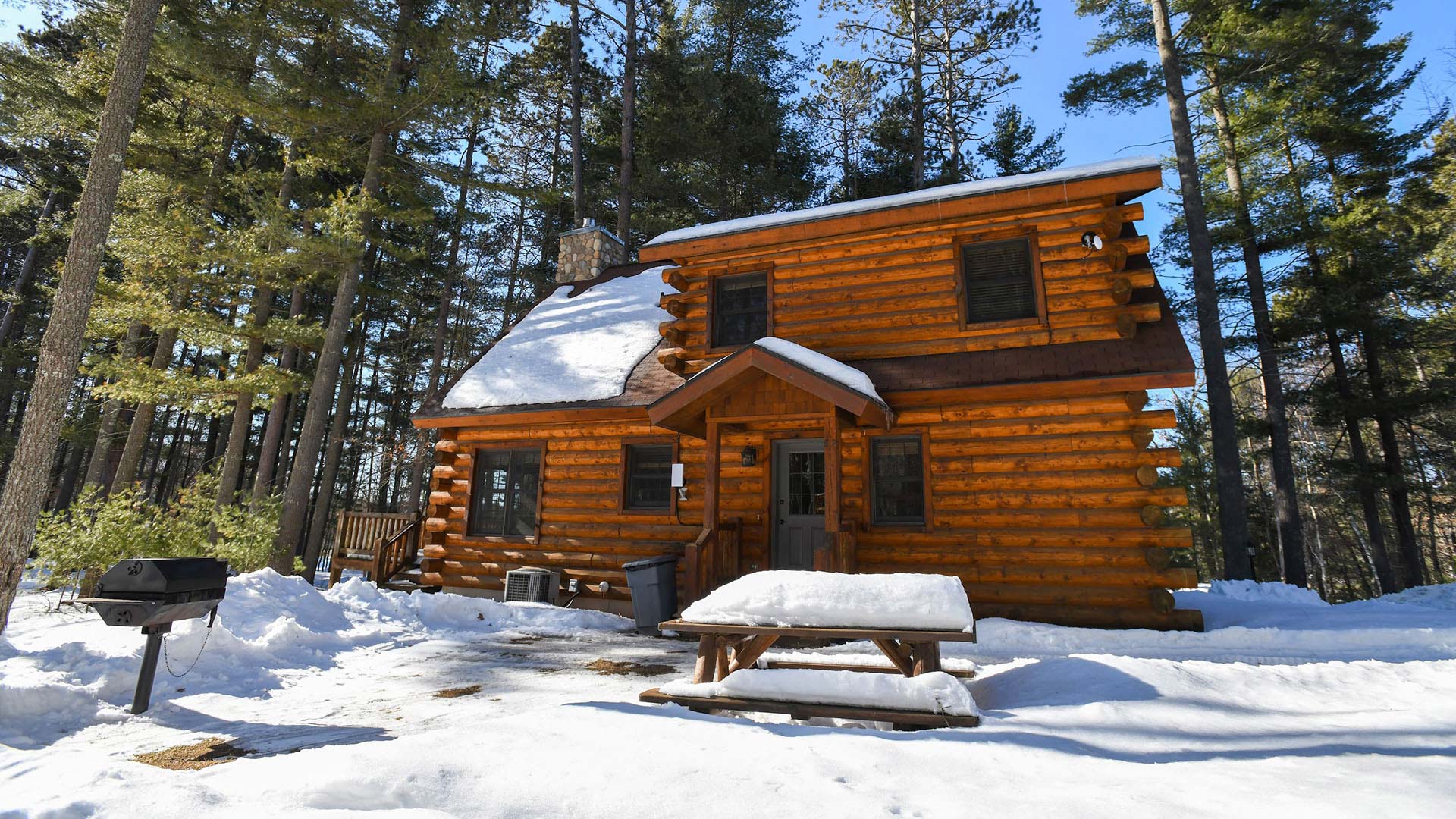 WINTER FUN IN ONEIDA COUNTY | Exterior shot of a snow covered lodge at The Beacons