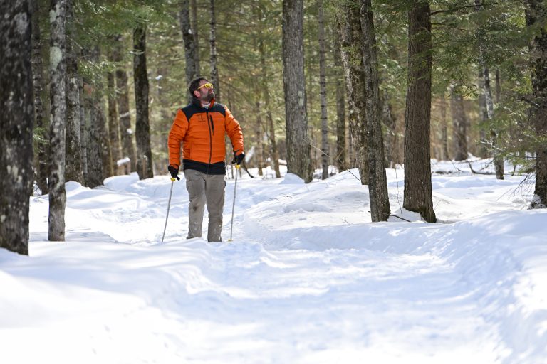 Snowshoeing on snow covered trail