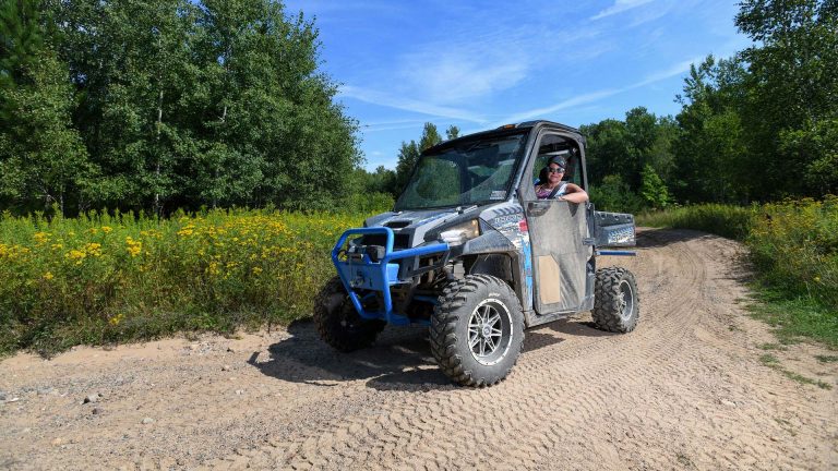 ATVing & UTVing | UTV riving on the dirt trail in Oneida County