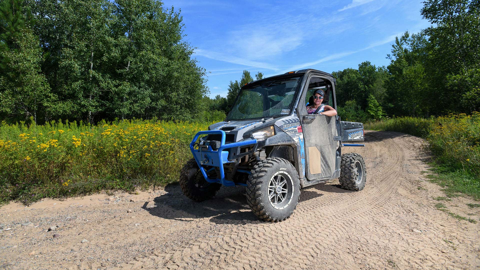 ATVing & UTVing | UTV riving on the dirt trail in Oneida County