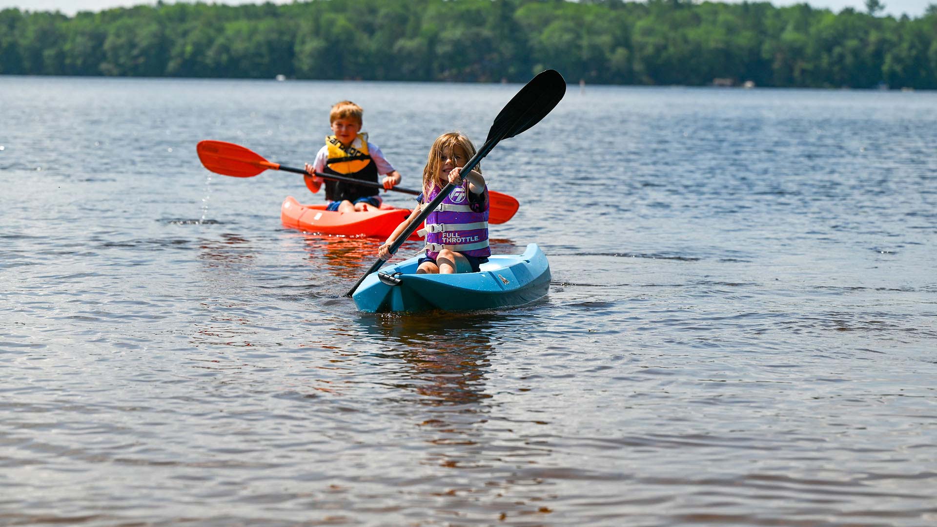 Activities | Young brother and sister kayaking in front of Merry Dale Resort