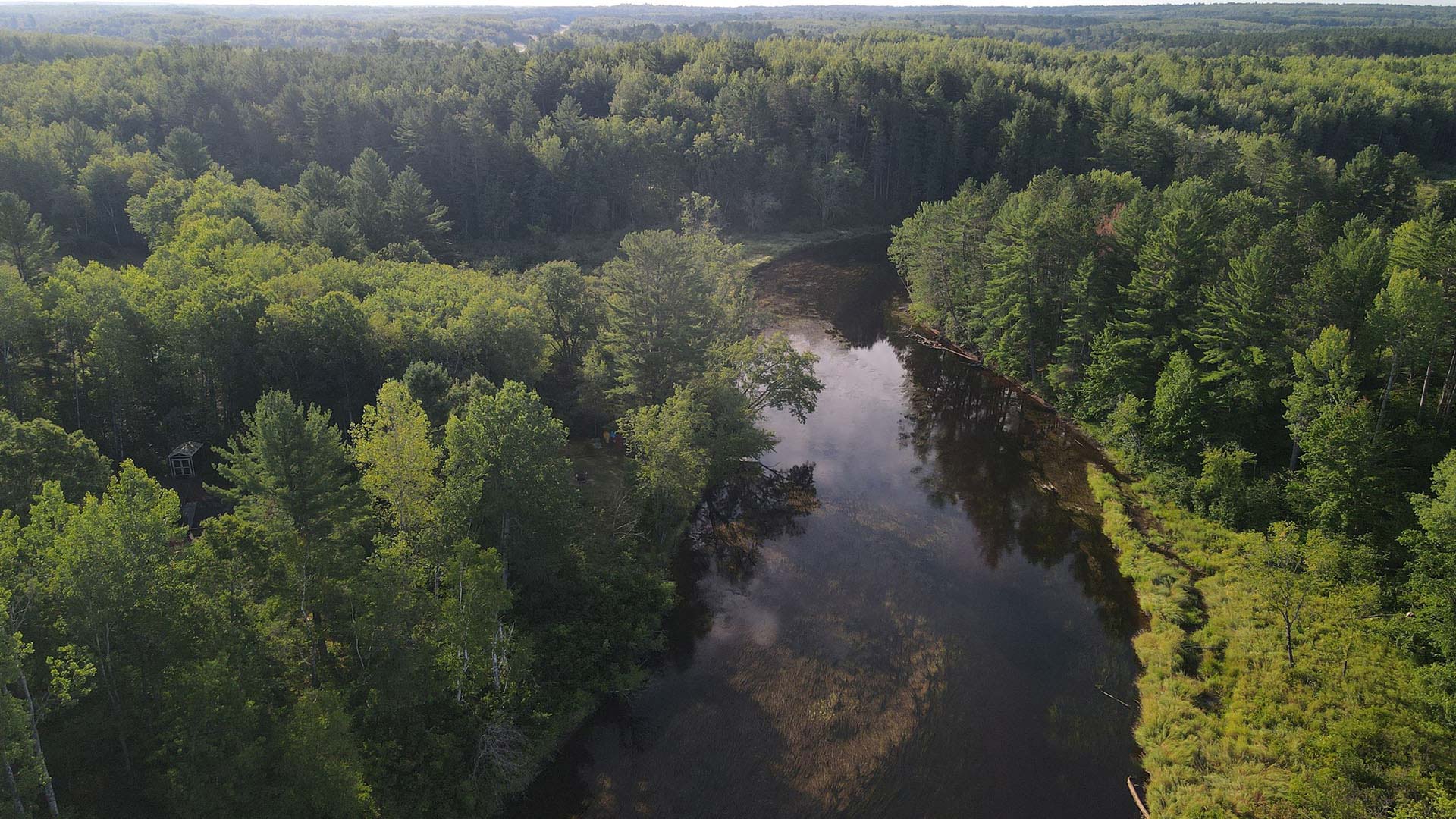 VISIT ONEIDA COUNTY THIS SUMMER | Aerial view of a winding Tomahawk River