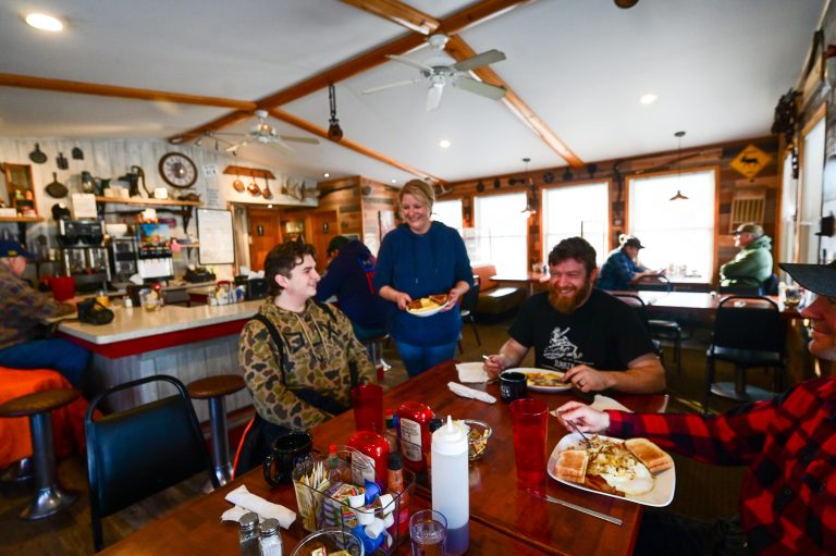 Dee Dee’s Diner | Customers eating breakfast being served by friendly waitress at Dee Dee's Diner in Sugar Camp