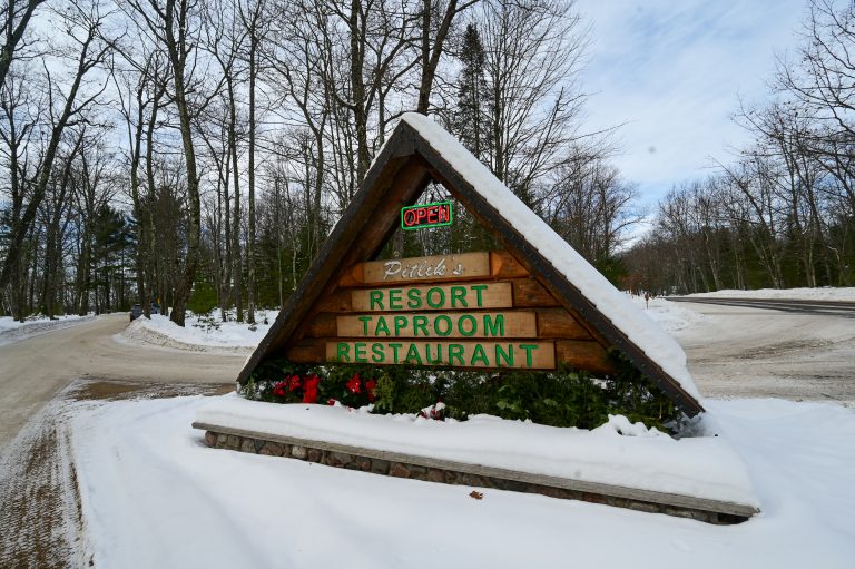 Pitlik’s Sand Beach Resort | Entrance sign to Pitlik's Sand Beach Resort