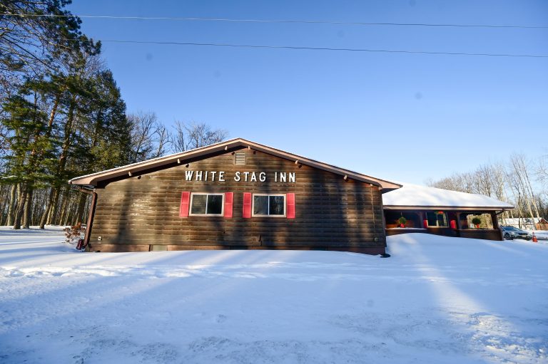 White Stag Inn | Log exterior of White Stag Inn during the winter
