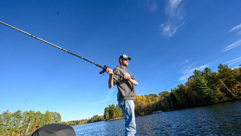 Related Article: Where to find musky, walleye & more in Oneida County | Man casting a musky pole from a boat on a lake in Oneida County Wisconsin